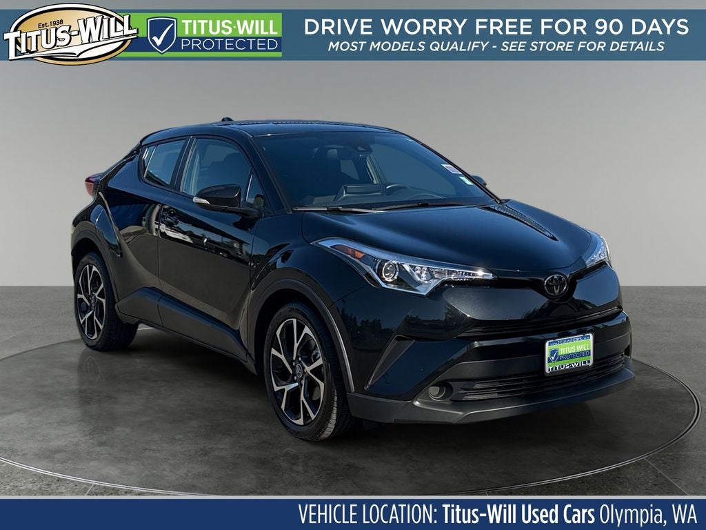 2019 Toyota C-HR XLE in Black Sand Pearl — front three-quarter view