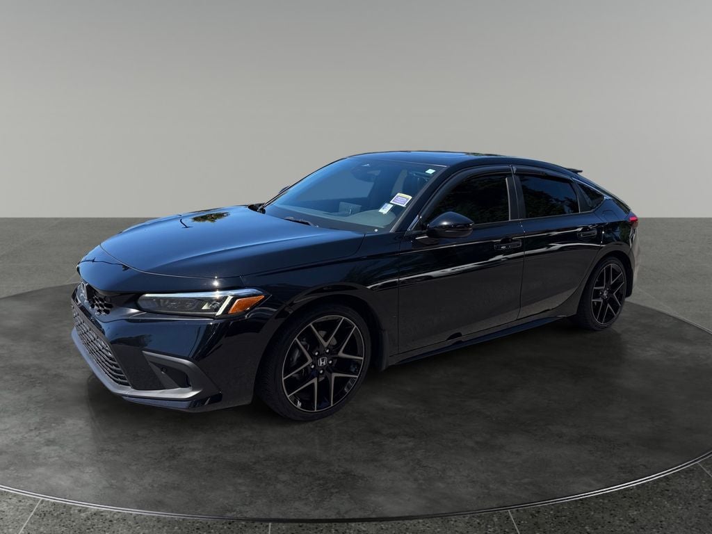 2024 Honda Civic — rear three-quarter view