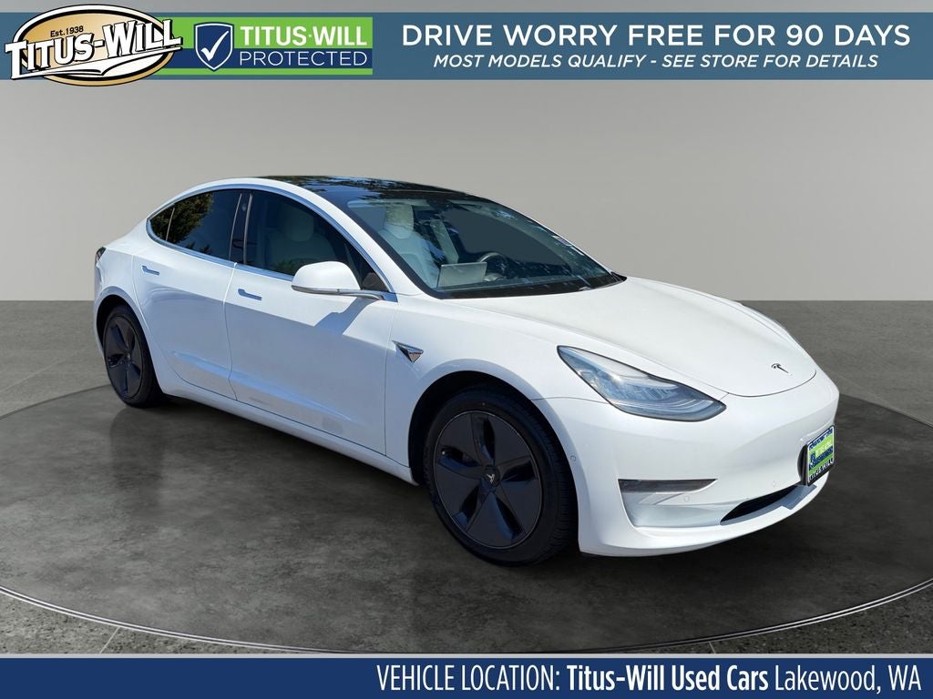 2020 Tesla Model 3 Standard Range Plus in White — front three-quarter view