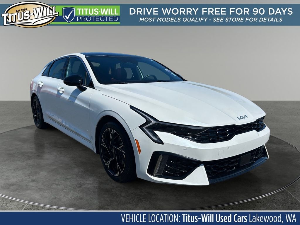 2025 Kia K5 GT-Line in Snow White Pearl — front three-quarter view