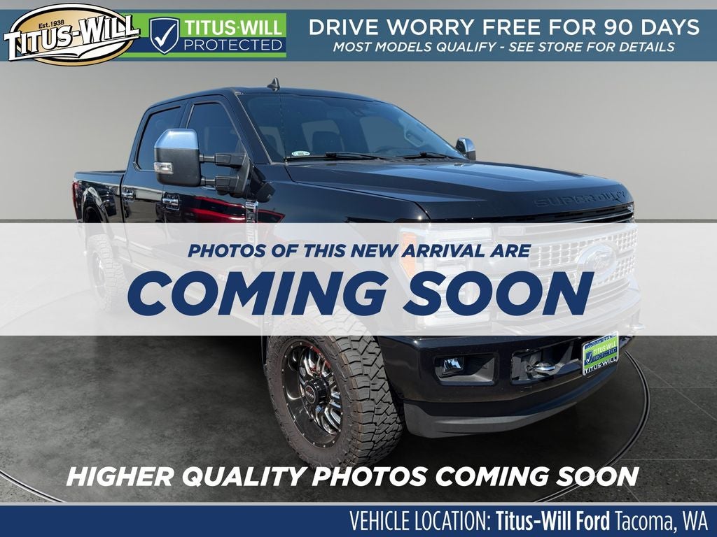 2019 Ford F-350SD Platinum in Black Metallic — front three-quarter view