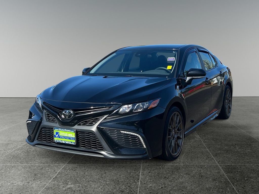 2024 Toyota Camry — rear three-quarter view