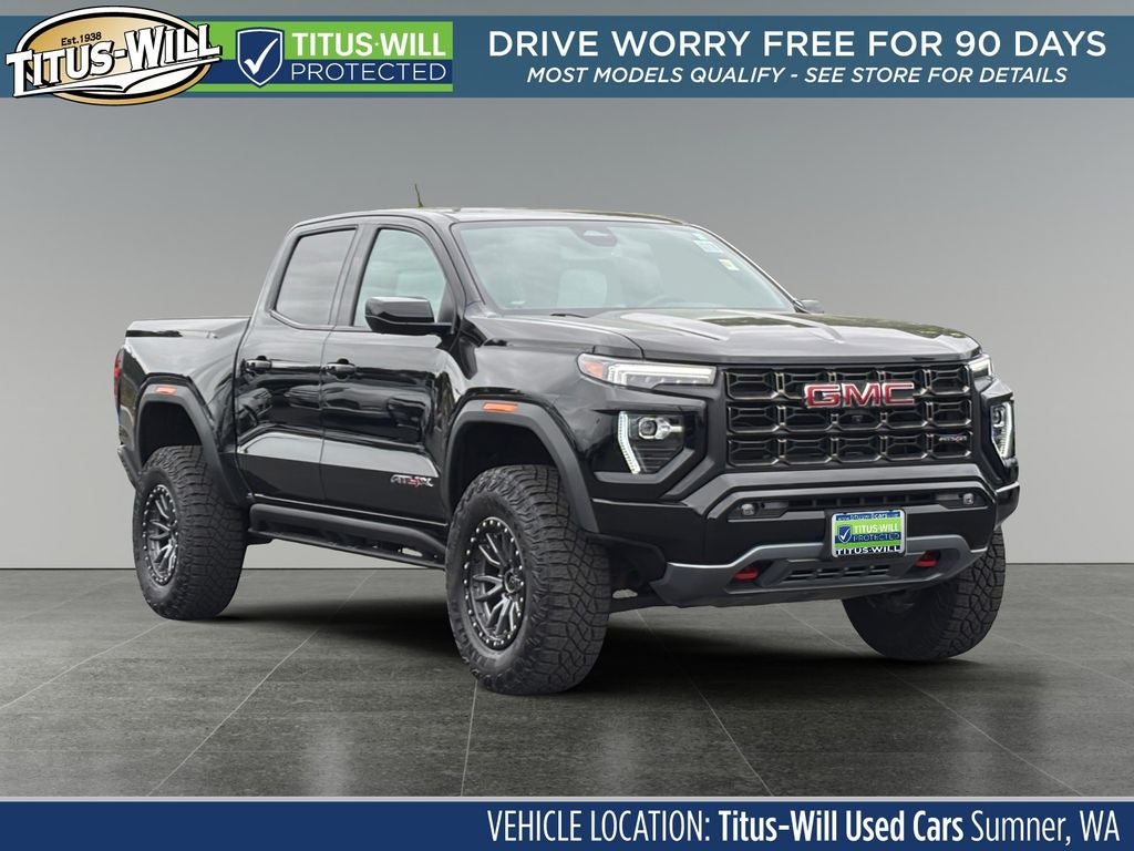 2024 GMC Canyon AT4X in Onyx Black — front three-quarter view