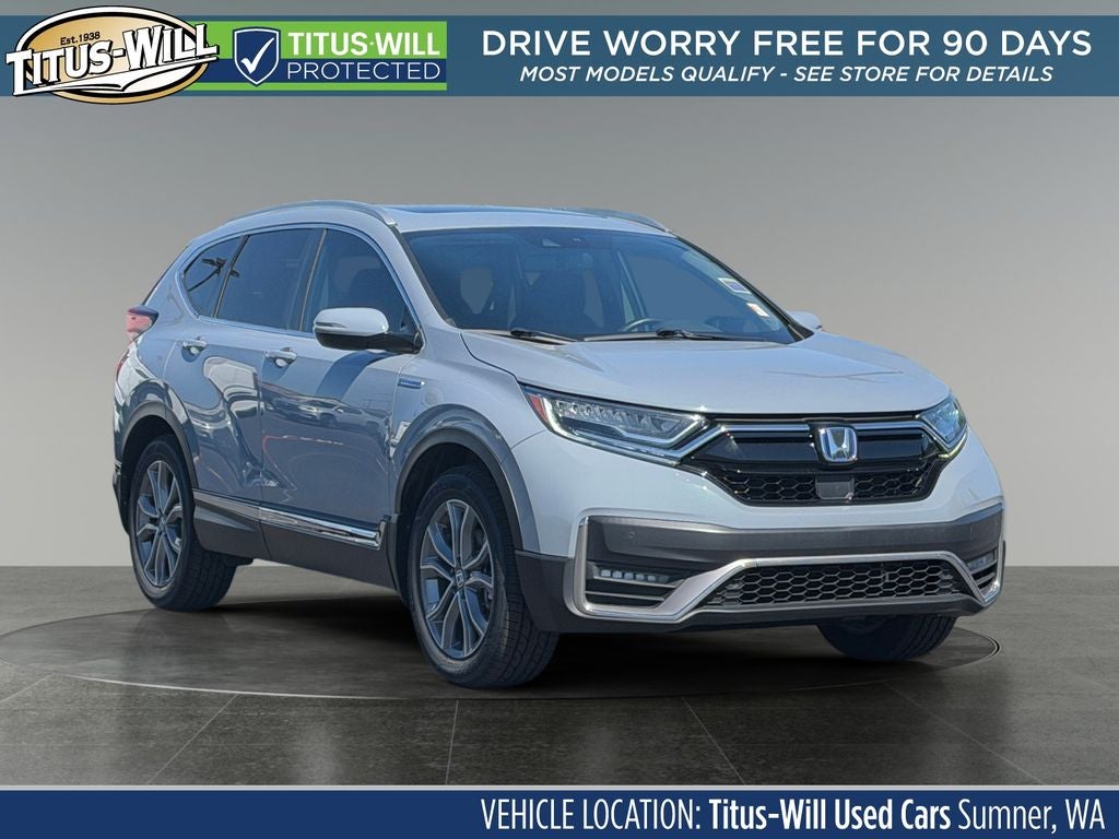 2022 Honda CR-V Hybrid Touring in Blue — front three-quarter view