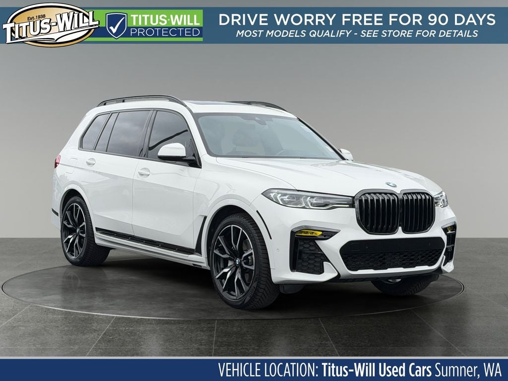 2021 BMW X7 xDrive40i in Alpine White — front three-quarter view