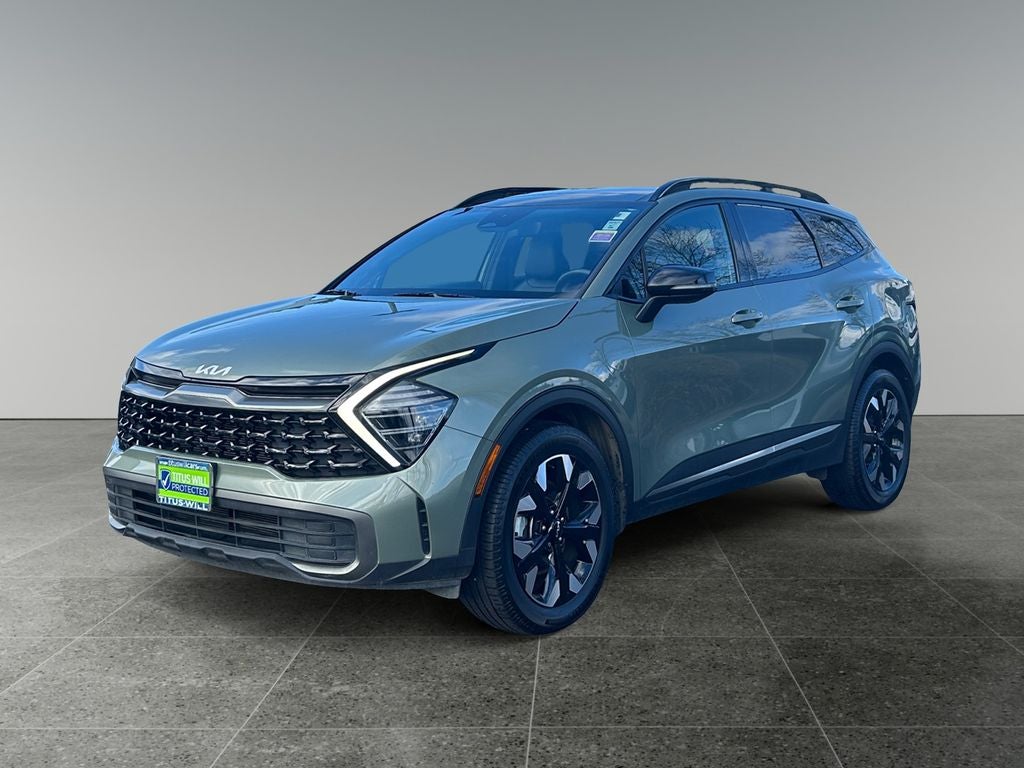 2024 Kia Sportage — rear three-quarter view