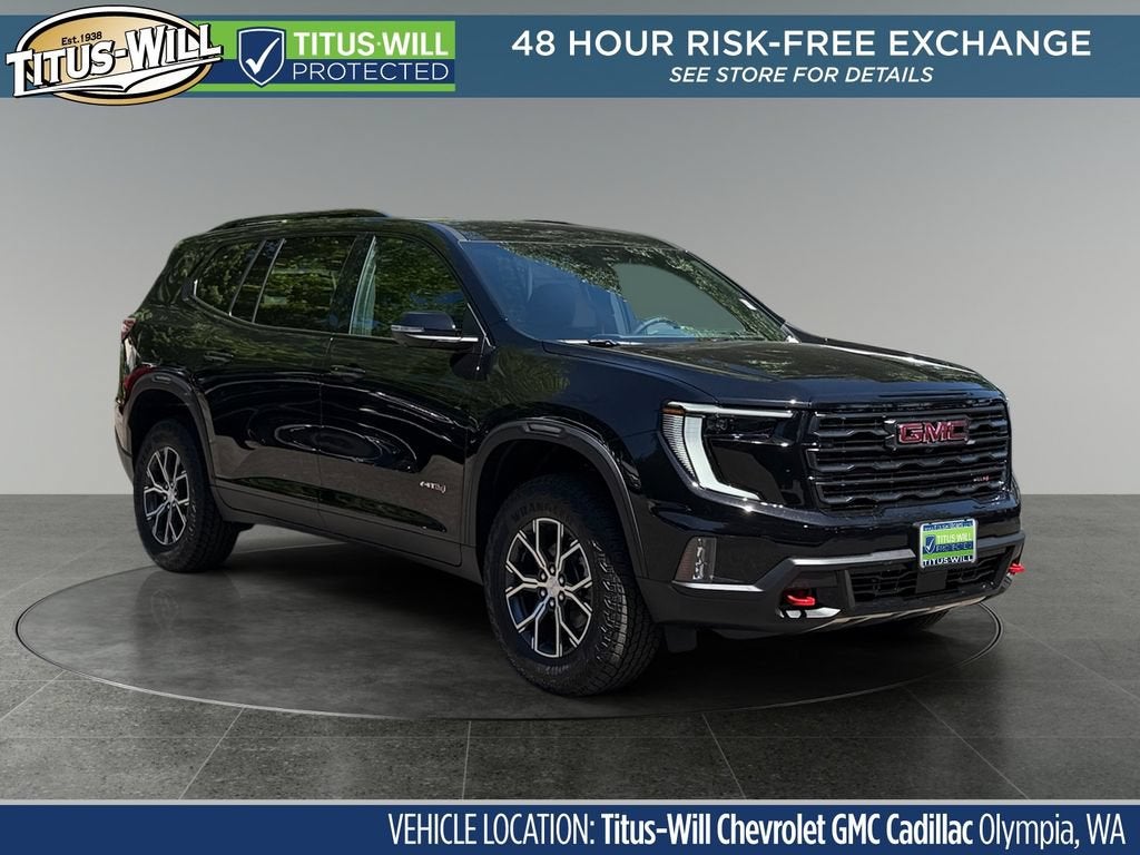2026 GMC Acadia AT4 in Ebony Twilight Metallic — front three-quarter view
