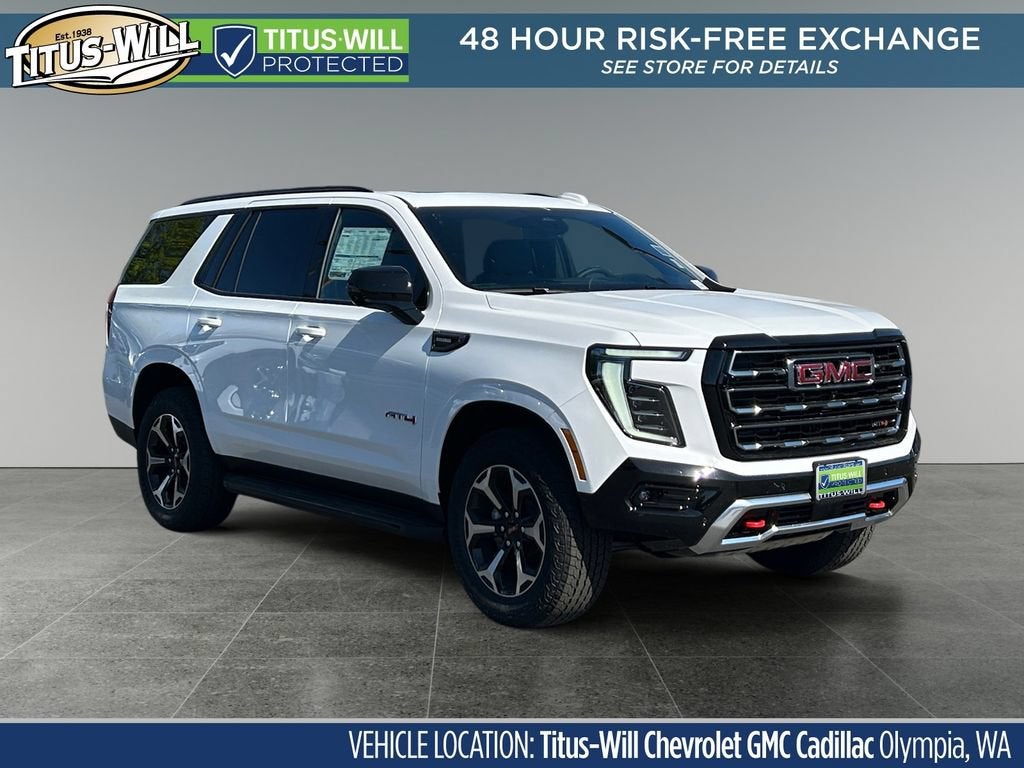 2026 GMC Yukon AT4 in Summit White — front three-quarter view