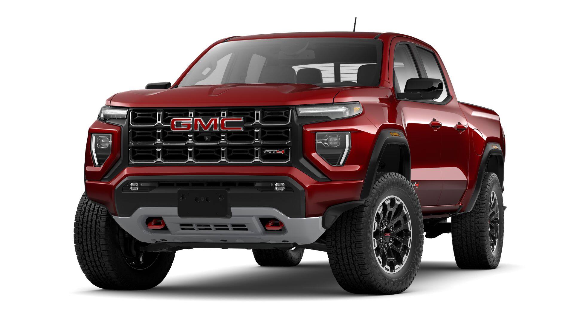 2026 GMC Canyon AT4 in Volcanic Red Tintcoat — front three-quarter view