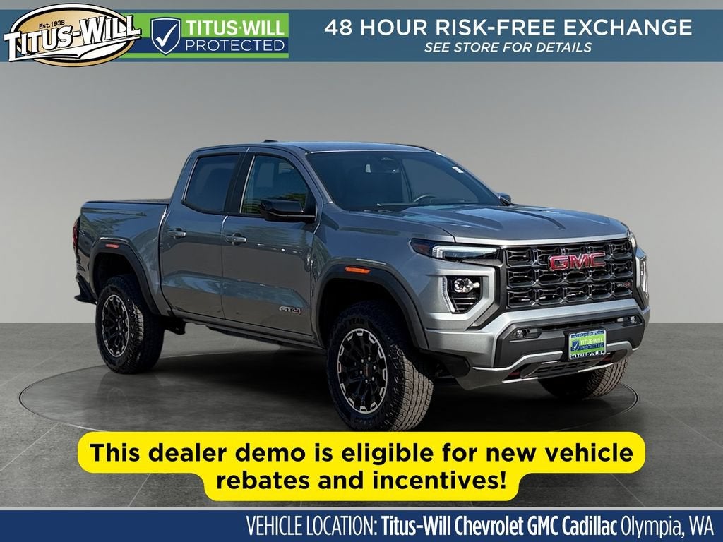 2026 GMC Canyon AT4 in Sterling Metallic — front three-quarter view