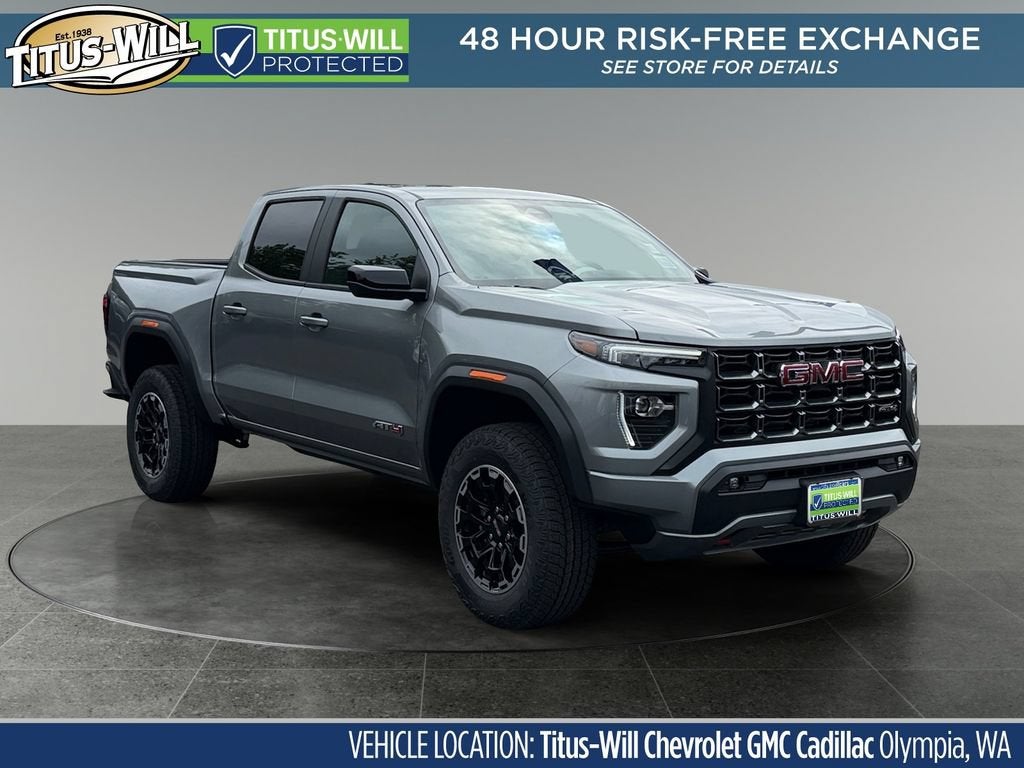 2026 GMC Canyon AT4 in Sterling Metallic — front three-quarter view