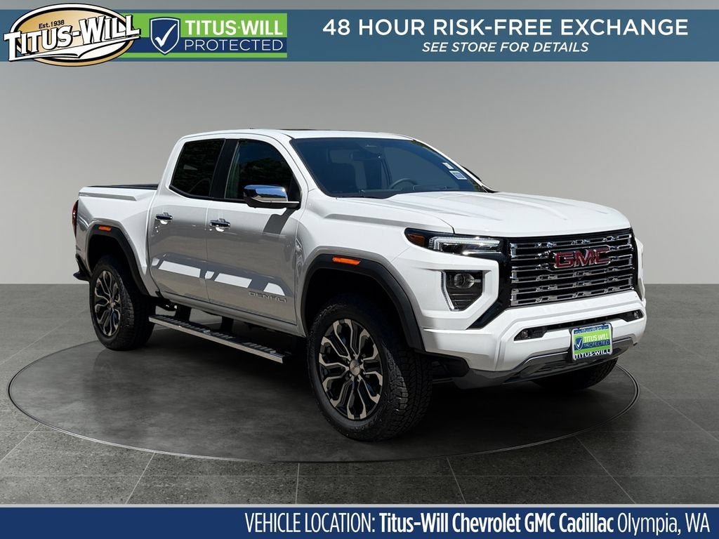 2026 GMC Canyon Denali in Summit White — front three-quarter view