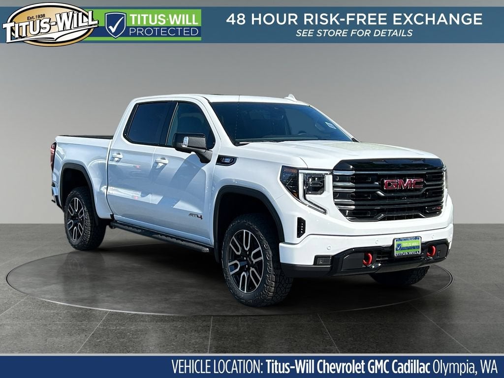 2026 GMC Sierra 1500 AT4 in Summit White — front three-quarter view