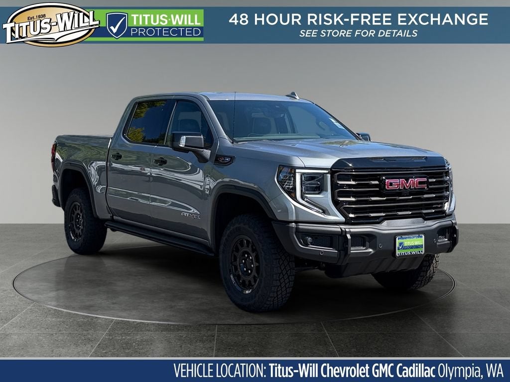 2026 GMC Sierra 1500 AT4X in Sterling Metallic — front three-quarter view