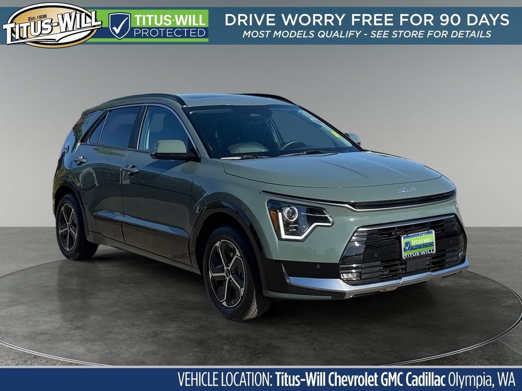 2025 Kia Niro SX in Green — front three-quarter view